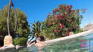 Feel the thrill as Nina Rivera and Sully Savage dive underwater for poolside pussy licking