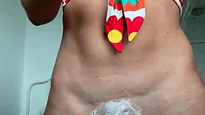 Outdoor shower soaks body before smooth pussy shave reveal