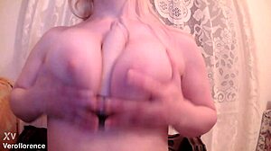 i shove this big dildo right between my huge blonde tits playing solo