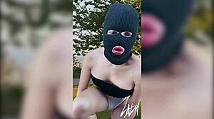 the horny shemale sneaks to public park fingering her big ass tits on webcam