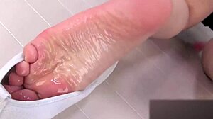 I can't resist rubbing lotion on her silky japanese soles hearing those moans