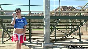 black haired cheerleader opens wide for cum in mouth