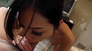 Why's this asian mommy deepthroating cock in fishnets on the bed?