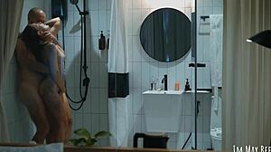 Couple showers together after facial cumshot cleans easier.