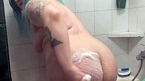 Chubby Tattooed Beauty Teases Big Ass Tits Wet Pussy in Steamy Shower