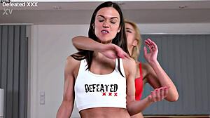 Hey, check out this sexy Italian wrestler scissoring her foe into submission 😈💥