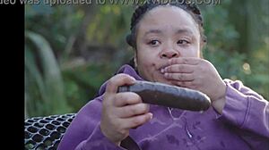 ebony babe pounds huge clit pussy on public bench with dildo