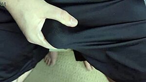 She slides soft shorts over bare pussy for close-up tease