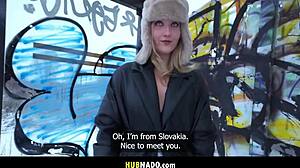 A hot blonde flashes her natural tits waiting at bus stop