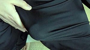 She slides soft shorts over bare pussy for close-up tease