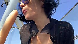 brunette babe squirts riding dildo on ferris wheel