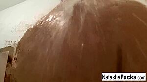 Busty brunette Natasha Nice masturbates sexy in black light