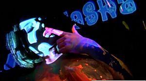 Busty brunette Natasha Nice masturbates sexy in black light