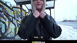 A hot blonde flashes her natural tits waiting at bus stop