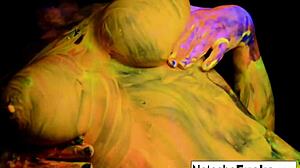 Busty brunette Natasha Nice masturbates sexy in black light