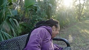 ebony babe pounds huge clit pussy on public bench with dildo