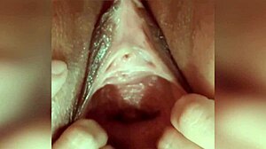 mature milf's huge shaved pussy gapes wide open from extreme hardcore fingering and hand stretching