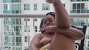 woman squirts massive pussy spray from balcony in outdoor toy masturbation