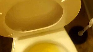I'm the 21 year old pissing in the toilet penis peeking out