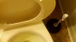 I'm the 21 year old pissing in the toilet penis peeking out