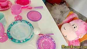 Tattooed lesbian squirts milk in messy squirting frenzy