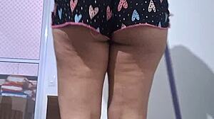 Husband captures wife scrubbing floor in skimpy outfit