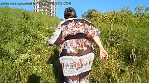 hairy mature flashes beaver through see-through dress outdoors