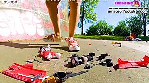 Kati the giantess crushes toy cars stomping plastic under sneakers