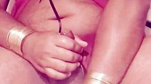 Shemale in sexy dress strokes hard cock wildly