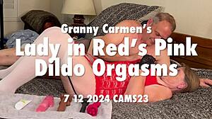 granny carmen's lady in red squirms wildly on her pink dildo to massive orgasms
