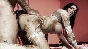 a naughty brunette oils up with her man for steamy doggy style action