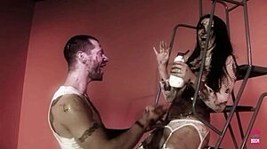 a naughty brunette oils up with her man for steamy doggy style action