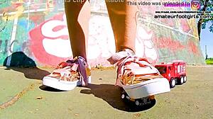 Kati the giantess crushes toy cars stomping plastic under sneakers