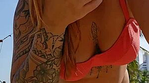 Filming beach video flashing to tease african males nearby