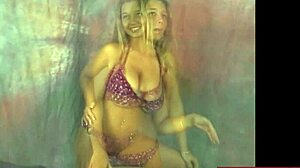 Busty Christina Strips Purple Bikini Teasing Her Massive Tits While Dancing Seductively