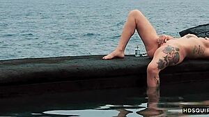 Free spirit cat asstrophe relaxes by the shore with natural outdoor squirting vibes