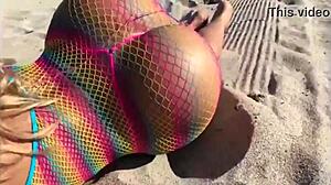 Whoa gorgeous blonde milf flaunts big ass tits on beach