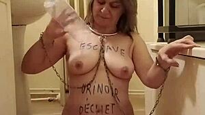 Slave endures uro belt torment