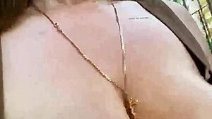 Webcam slut fingers shaved pussy while shaking huge tits