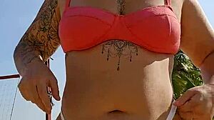 Filming beach video flashing to tease african males nearby