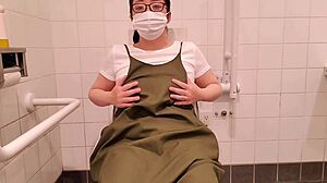 housewife frantically fingers pussy in toilet stall, why so desperate?