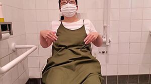 housewife frantically fingers pussy in toilet stall, why so desperate?