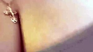 Webcam slut fingers shaved pussy while shaking huge tits