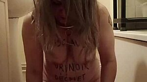 Slave endures uro belt torment