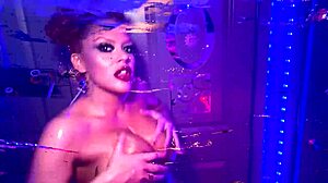 Redhead babe oils huge tits strips teases in kitchen closeup