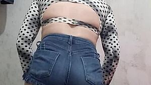a sexy latina trans rebolando her ass in tight shorts