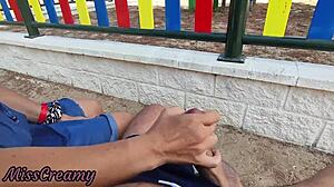 dude i flash my cock at her in the park and she jerks it till i cum all over those tits