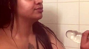 damn, fresh faced slut bares her huge ass and pounds pussy with dildo in steamy shower!