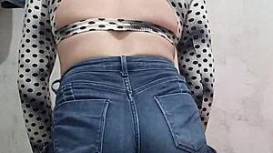 a sexy latina trans rebolando her ass in tight shorts