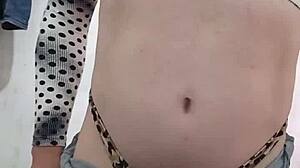 a sexy latina trans rebolando her ass in tight shorts